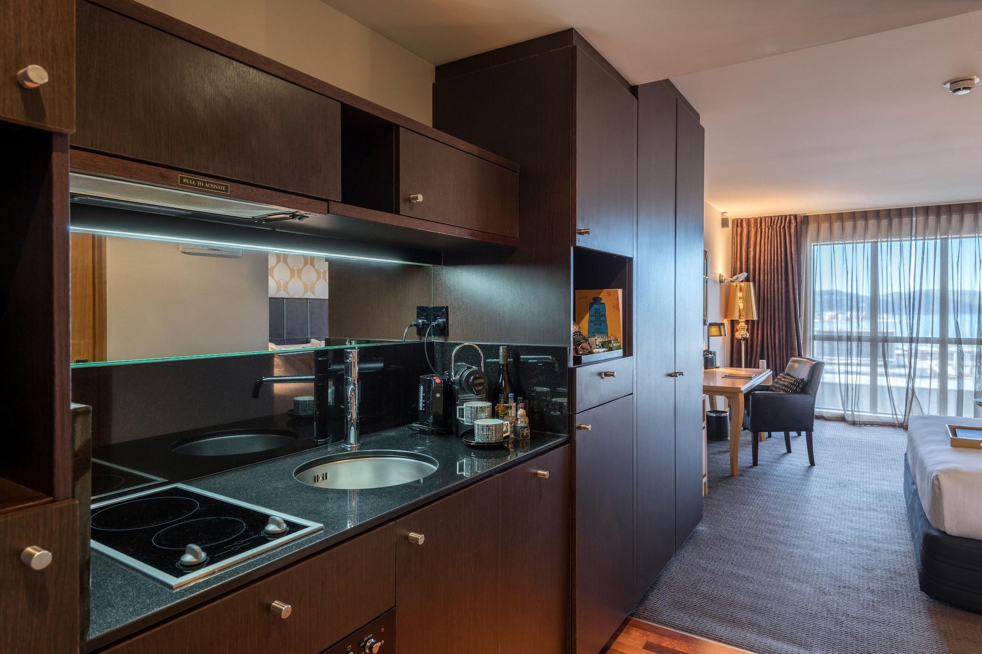 Qt ウエリントン アパートメンツ ウェリントン エクステリア 写真 Kitchenette in a serviced apartment
